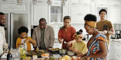 family preparing food in the kitchen