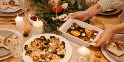 person serving a food on christmas dinner