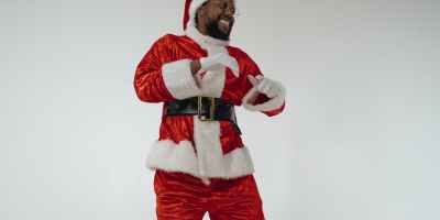 man in santa claus costume dancing