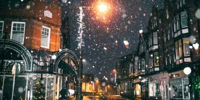 rain of snow in town painting