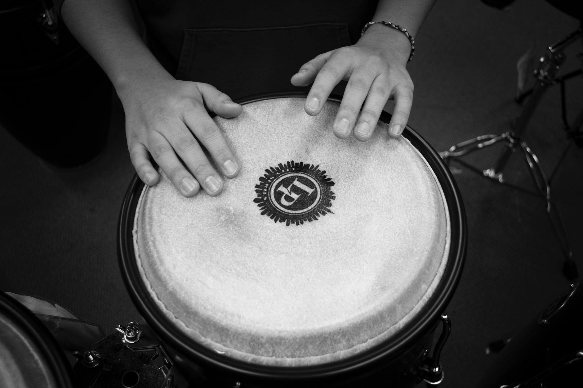 person holding drums