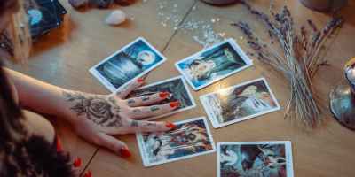 assorted tarot cards on table