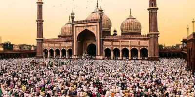 photo of crowd of people gathering near jama masjid delhi