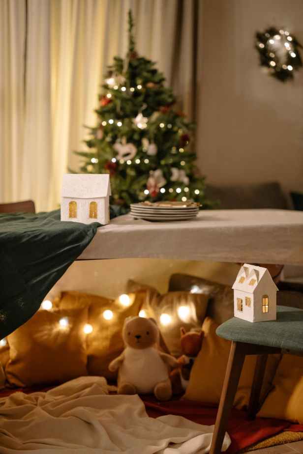 decorations and stuffed toys under a dining table