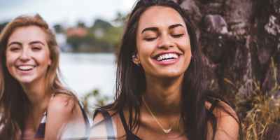two women smiling